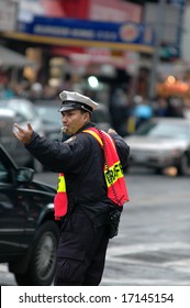 Traffic Cop Directing Traffic