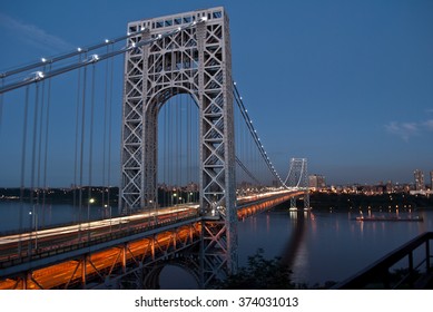 Traffic Crosses The George Washington Bridge At Dusk