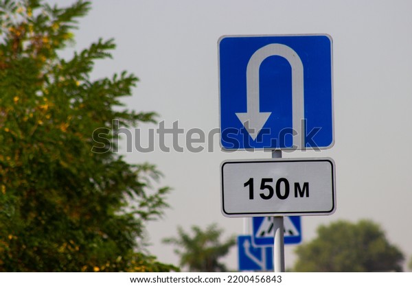 traffic direction sign white reverse arrow on
blue background