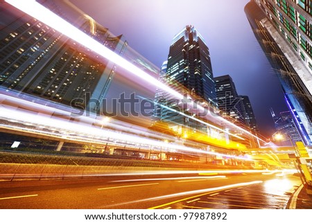 Similar – Bus and traffic light, black and white shot with motion blur