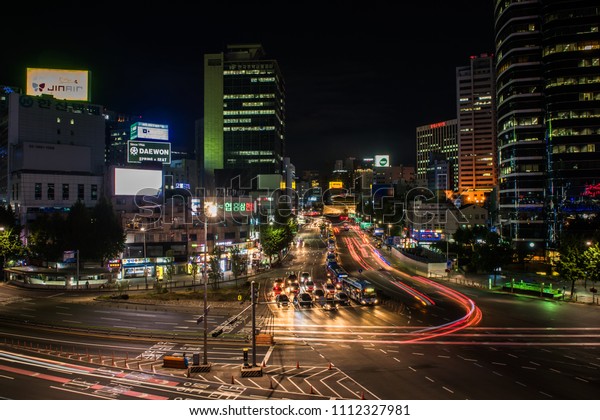 Traffic hub Seoul\
Korea.05.26.2017.\
The wonderful night view traffic hub and car\
lights trailes.