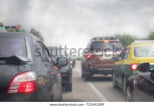 traffic jam of cars, smog pollution on the road,\
blur picture