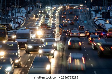 Traffic jam in the city. Blurred cars on the night city street