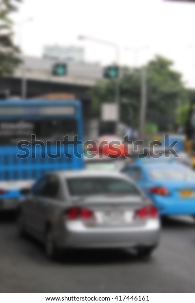 traffic jam in\
the city/ pollution/ people/\
blur