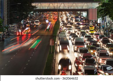 Traffic jam at the night street in megalopolis