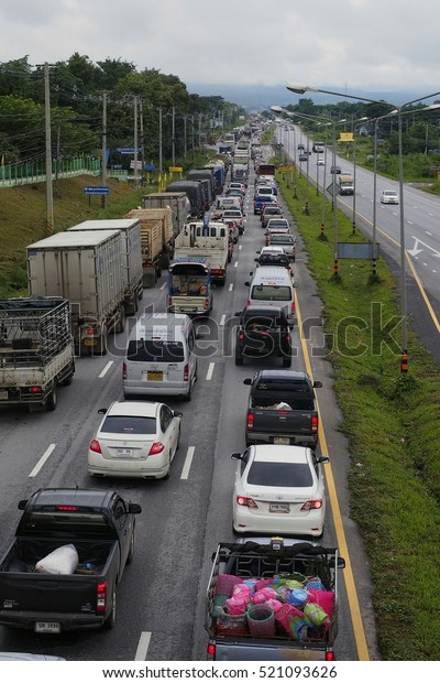 Traffic jam on High way road to\
Bangkok , at Mittrapap road  ,\
06/10/2016,Thailand.