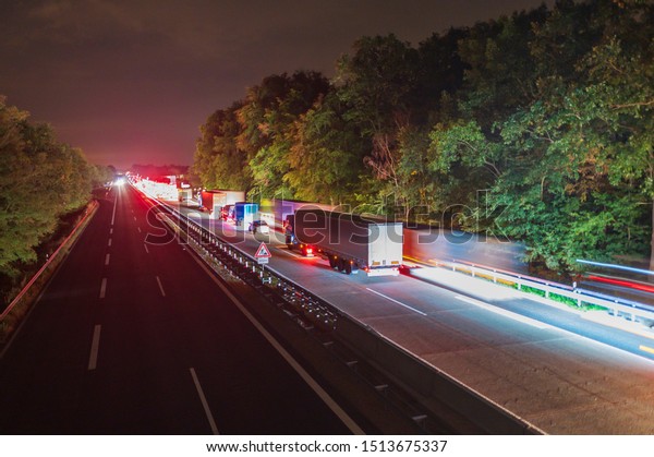 Traffic jam on the motorway , trucks use the\
motorway exit\
