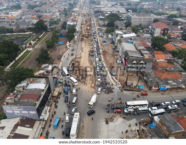 Traffic jam on the\
polluted streets of Bekasi. Has the highest number of motor\
vehicles and the traffic congestion is limited in few areas.\
Bekasi, Indonesia, March 24,\
2021
