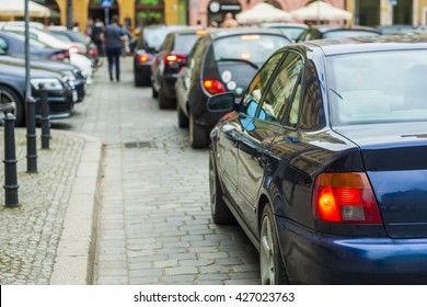Traffic jam and queue on the street in the middle of the town.