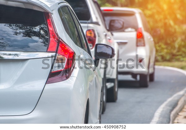 traffic\
jam with rows of cars during rush hour on\
road.