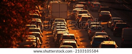 Traffic jam at sunset. Paralyzed traffic on city streets. Selective focus.
