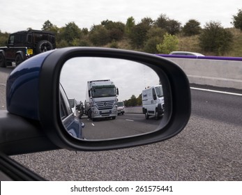 Traffic Jam Viewed Through A Car Wing Mirror, M1 Motorway,yorkshire,UK. Taken 02/10/2014