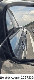 Traffic jammed car sidemirror view