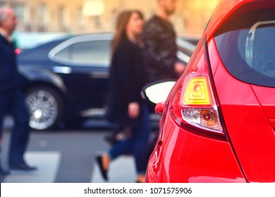 Traffic Laws For A Safety Of People. Pedestrians Walk Along A Crosswalk In A Lunch Hour. Peak Hour In A City.

