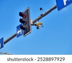 Traffic light with CCTV camera on the street       