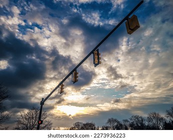 Traffic light in the clouds on a cloudy day