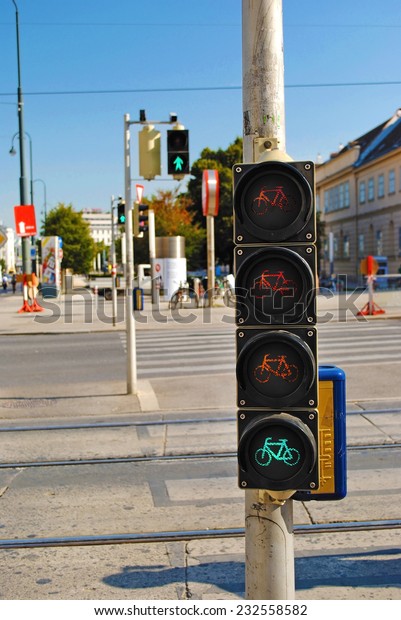 Traffic\
light for cyclists and pedestrians on the\
road