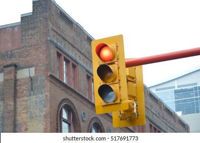 Traffic Light In Front Of The Old Building In Toronto Downtown. Red Light.