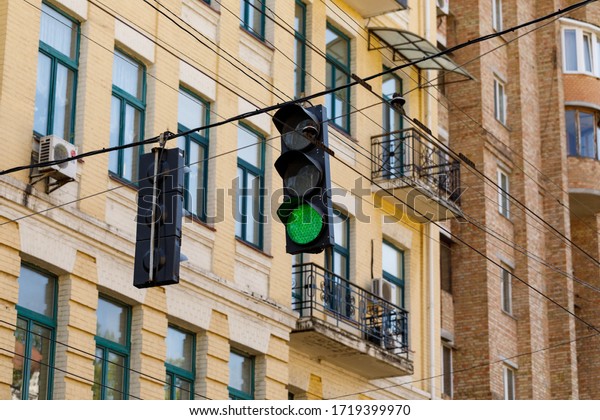 Traffic light with\
green color on kyiv\
street