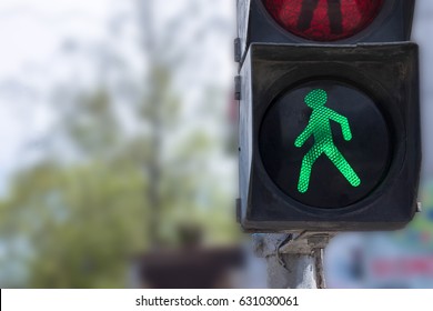 A Traffic Light With A Green Little Man. Safety On The Roads. Life Insurance.