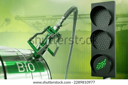Traffic light with leaf symbol and biofuel tank. Carbon neutrality concept