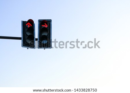 Traffic light and red arrow symbol, don't go straight ahead and don't turn right