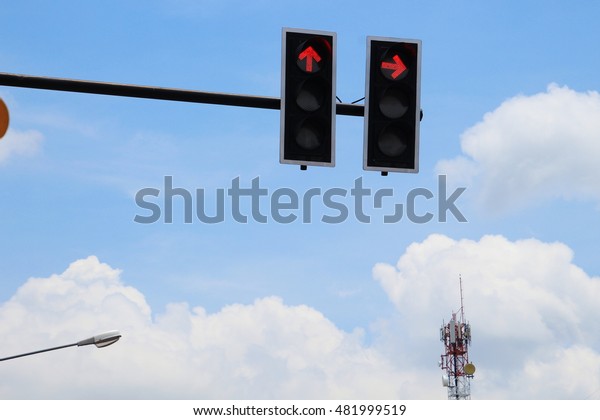traffic light ,red light, blue\
sky