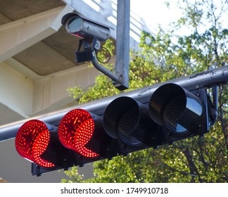 Traffic Light In Red With Security Cam.