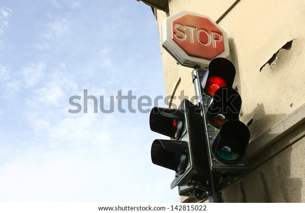 traffic light with red
light and sing stop
