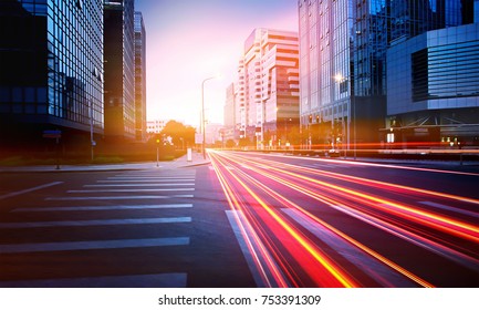 Traffic Light Trail In Between Building 