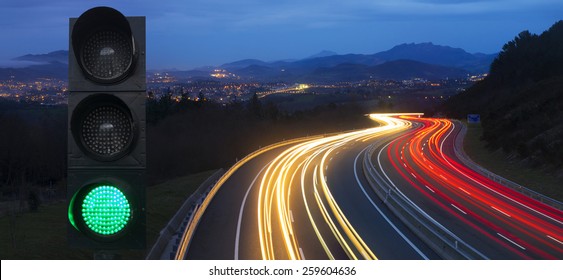 Traffic Lights, Car Lights At Night On The Road Going To The City