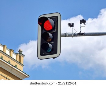 Traffic lights with a CCTV cameras controling the vehicle speed and velocity