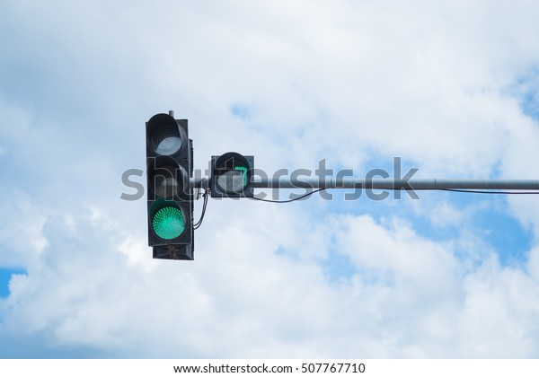 Traffic lights With the countdown. View of a\
traffic lights - red and orange\
lit