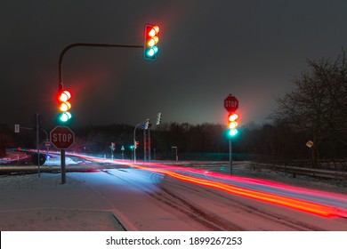 traffic lights at night in the snow