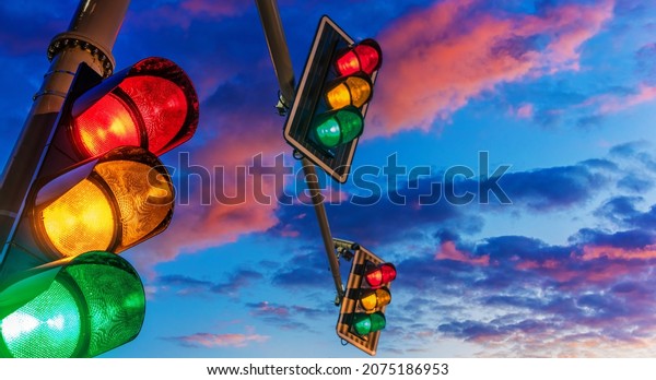 Traffic lights over urban\
intersection.