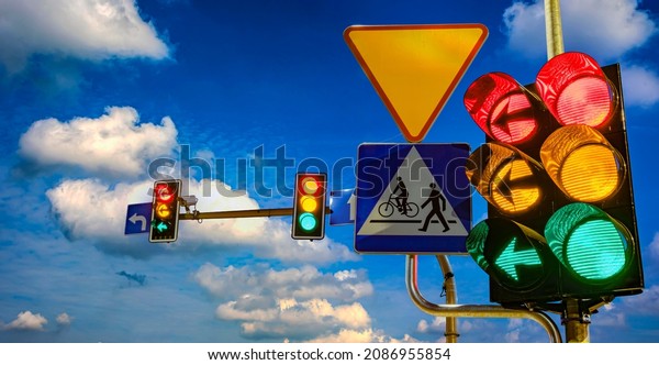 Traffic lights over urban\
intersection.