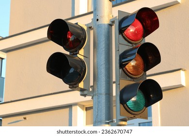 Traffic lights for pedestrians and traffic lights for vehicles at intersections