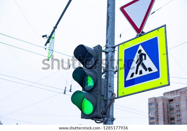 traffic lights with road\
signs