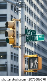 Traffic lights and road signs at Jay and Fulton Street, color toning applied, New York City, USA.