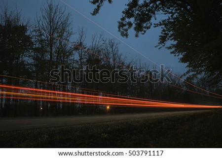 Similar – Landstraße bei Nacht Scheinwerfer