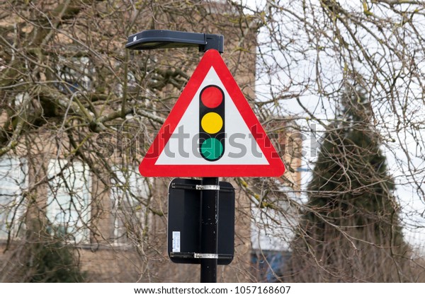 Traffic lights warning\
triangle sign