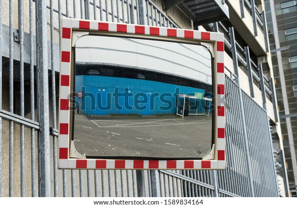 Traffic mirror to see cars coming from around the\
corner for safety