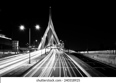 Traffic moving over the Leonard P. Zakim Bunker Hill Memorial Bridge at night, in Boston, Massachusetts.