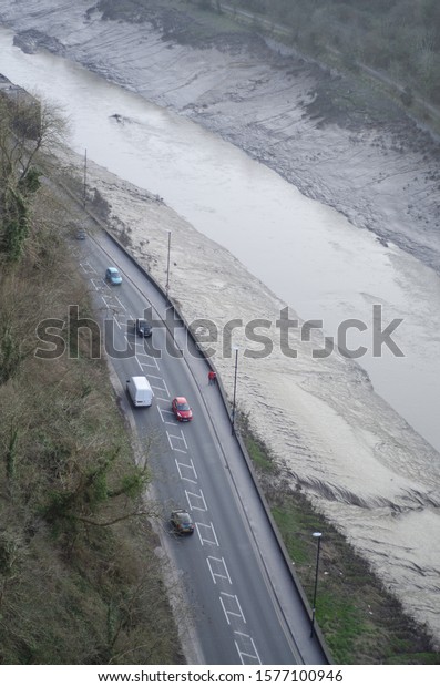Traffic near the River Avon in Bristol\
England as seen from the Clifton Suspension\
Bridge