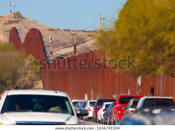Traffic near the United States border wall in\
Nogales Sonora Mexico