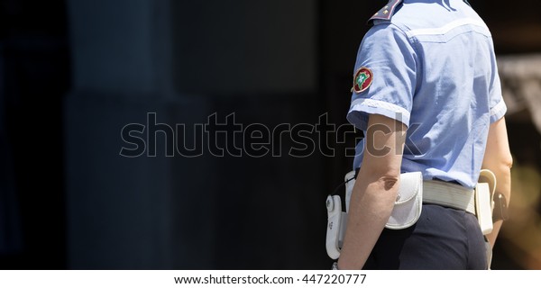 Traffic officer\
working outdoor in the\
traffic