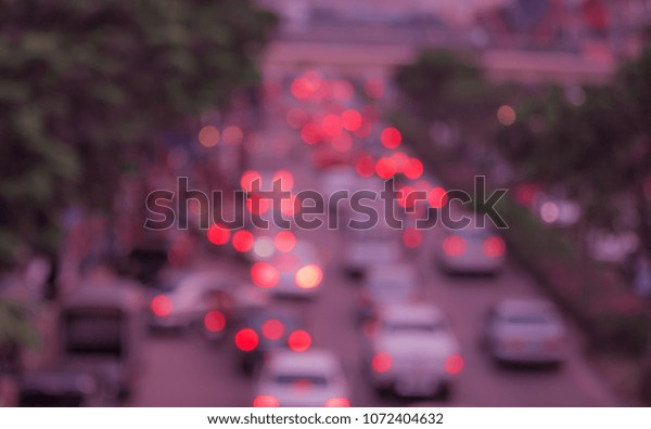 traffic on the city road. blurred headlight car
lights. evening city