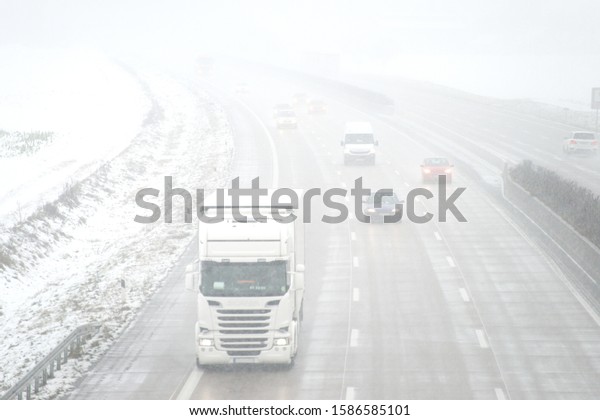 Traffic on a highway in\
winter