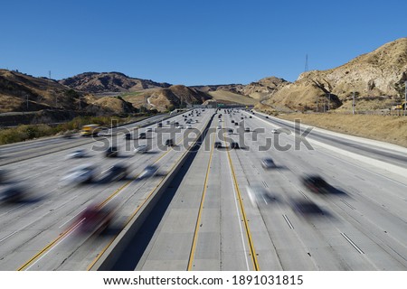 Traffic on the multi-lane I-5 Freeway, looking north, in Los Angeles County near Sylmar, California.