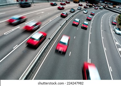 Traffic On Multiple Lane Highway With Motion Blur